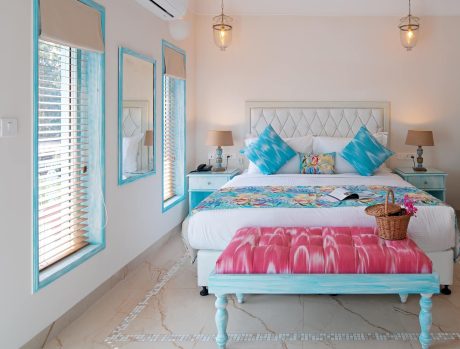 VivaStays Bedroom with Bed and Sofa